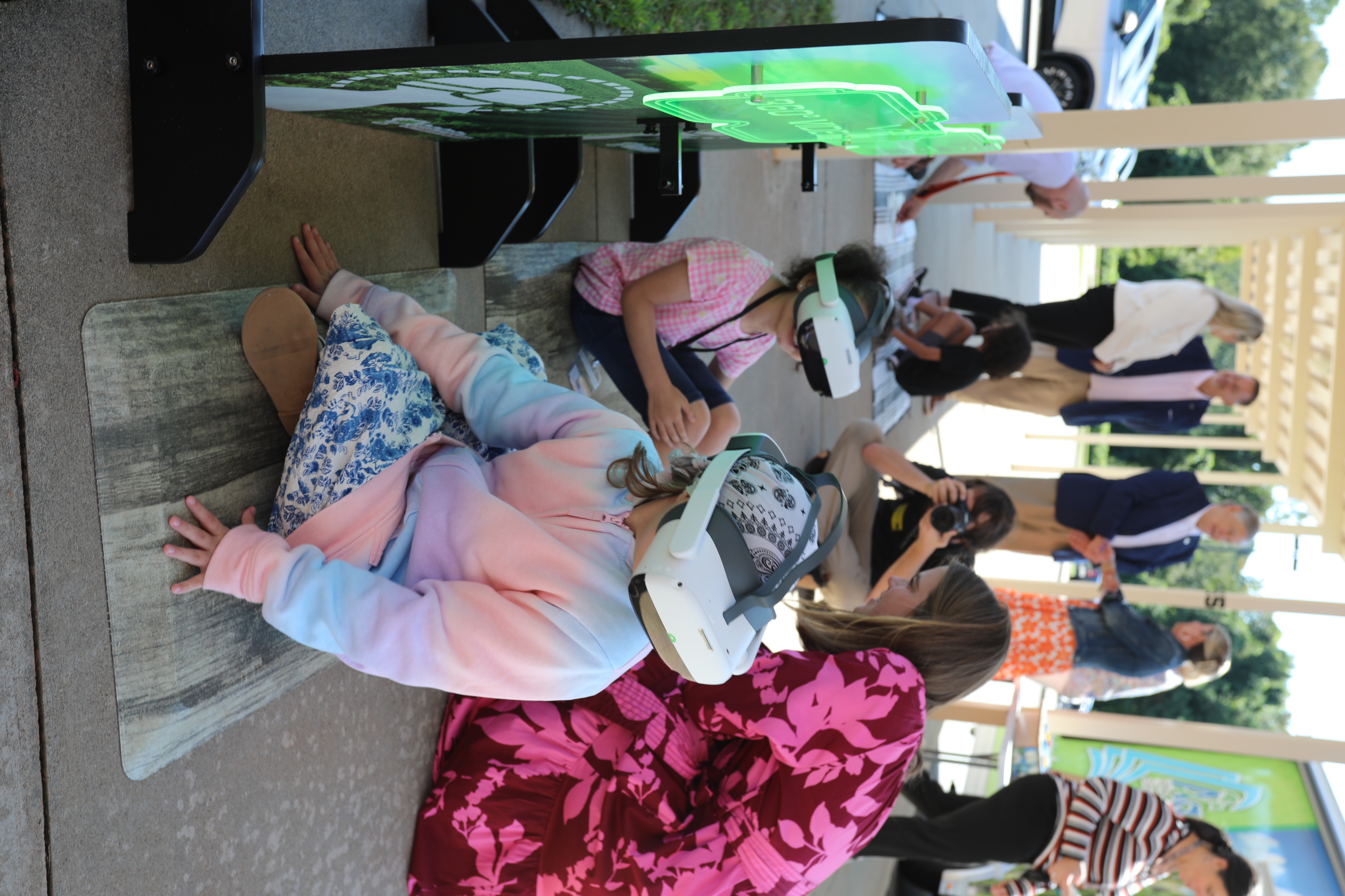 Students experiencing the Learning Lab's outside stations including virtual reality farm tours