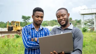 Men in field
