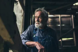 Farmer in a barn